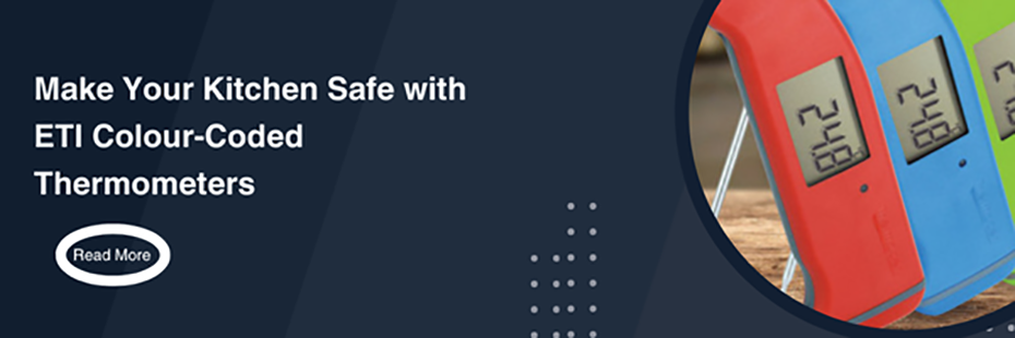 On the right is a framed circular image of red, blue and green ETI Thermapens stood on a wooden counter. On the left, large white text reads on a dark blue background reads "Make Your Kitchen Safe with ETI Colour-Coded Thermometers". Beneath this smaller white text framed by a white oval says "Read More".