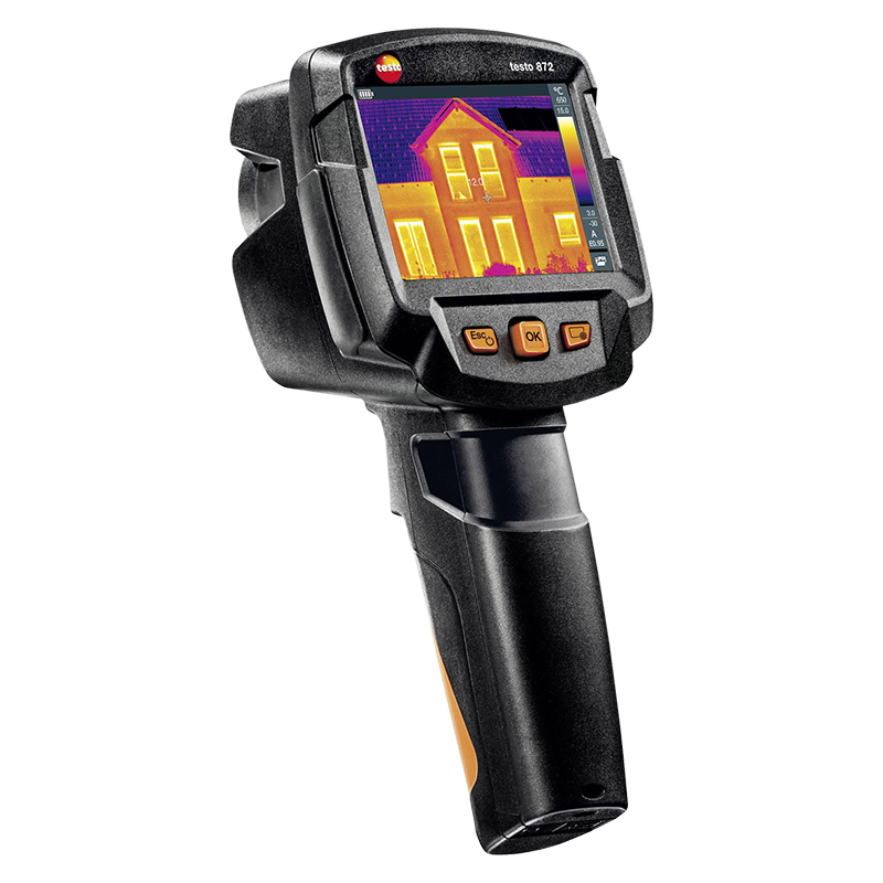 Testo 872s Thermal Camera with a thermal image of a house on its display. 