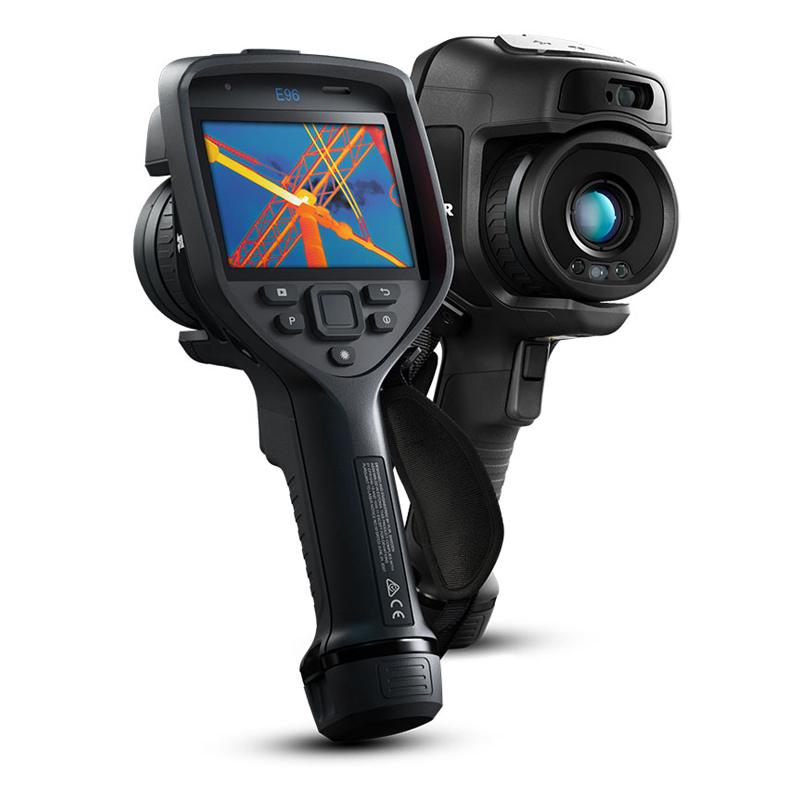 In the foreground is an angled Teledyne FLIR E96 Thermal Camera with a thermal image on the touchscreen display. Behind it is a face-on view of the back of the Teledyne FLIR E96 Thermal Camera with the lens facing the viewer. 