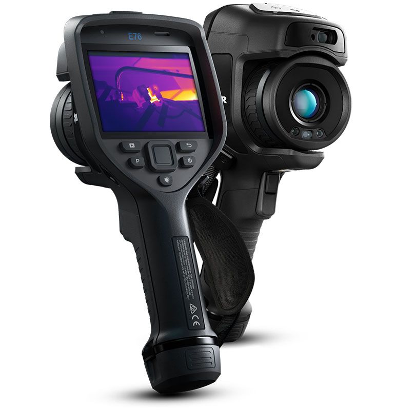 Two FLIR Exx Thermal Cameras. The one on the left faces backwards, showing the display. The one on the right faces forwards, showing the lens. 